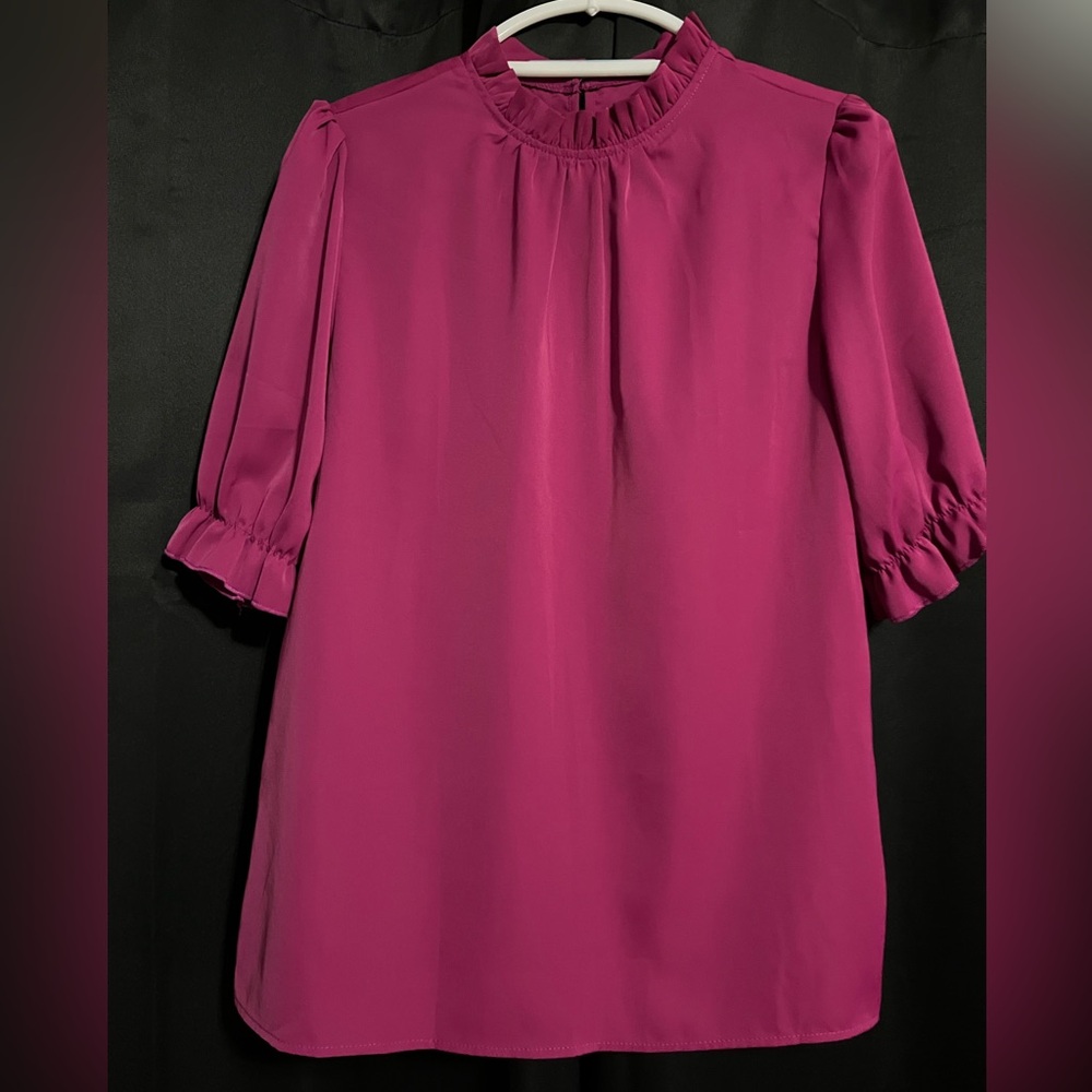 Fuchsia blouse, high neck, short sleeves, size medium.